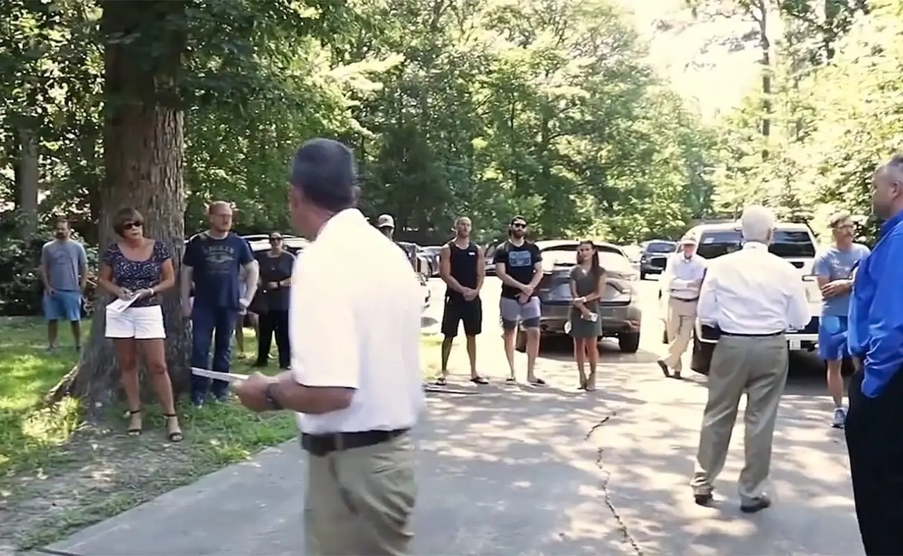 Bidders gathered at the property for a live SellWithZero auction